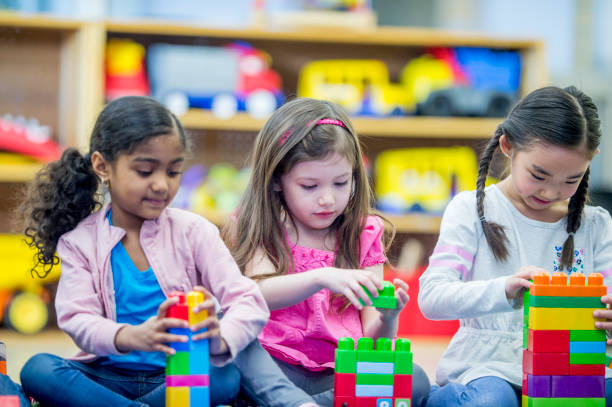 istock Girls Learning To Build 907460928