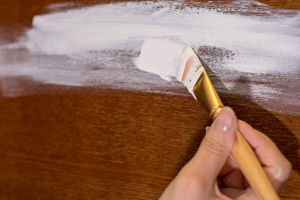 istock Furniture restoration chalk white paint 907460964