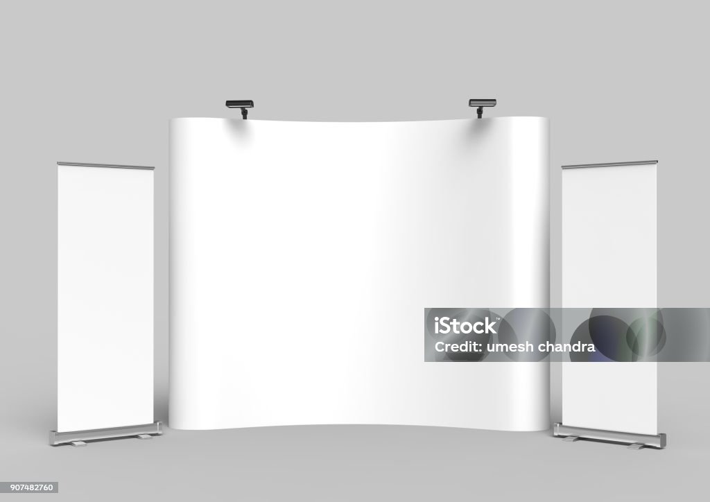 Exhibition Tension Fabric Display Banner Stand Backdrop for trade show advertising stand with LED OR Halogen Light with standees and counter. 3d render illustration. Exhibition Tension Fabric Display Banner Stand Backdrop for trade show advertising stand with LED OR Halogen Light with standees and counter. Kiosk Stock Photo