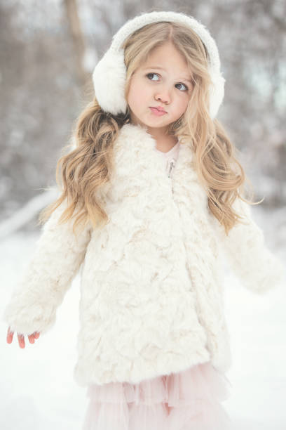 istock Little Girl in Snow 907504208
