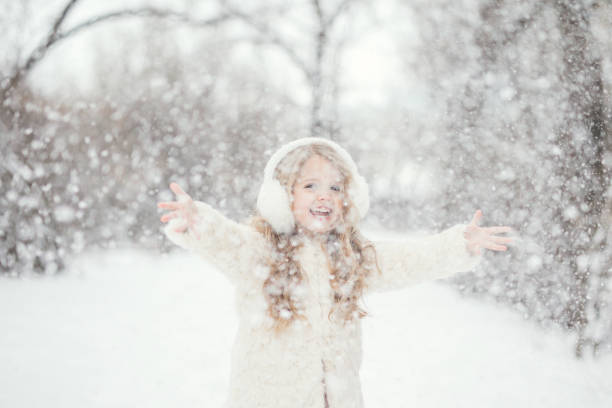 istock Little Girl in Snow 907504246