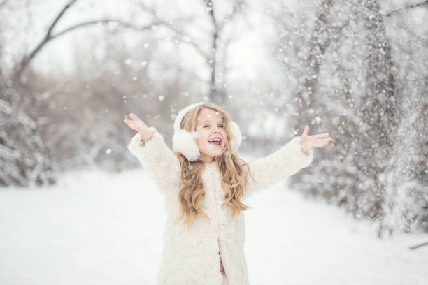 istock Little Girl in Snow 907504258