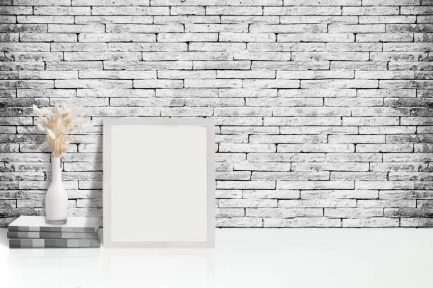 istock Mock up poster or photo frame  on white table,hipster minimalism desk space 907511472
