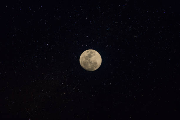istock Moon in the night with stars. 907527414
