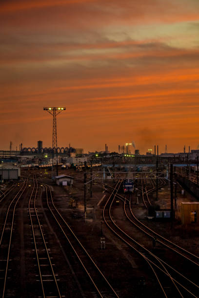 istock At the base of a freight train, at the sunset. 907546172