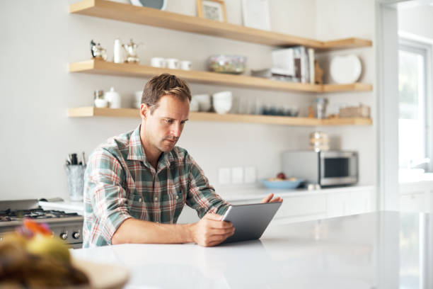istock Checking into the what's happening in the world 907548798