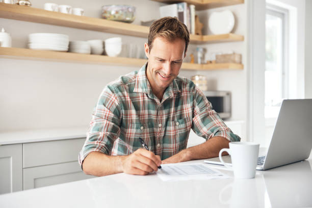 istock He's made some big savings with his monthly budget 907548820