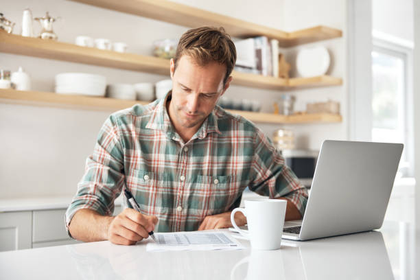istock He takes great care when it comes to handling finances 907548822