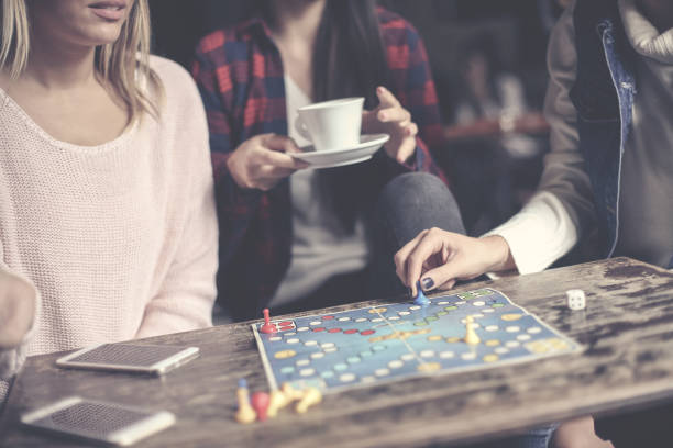 istock Play together a social game. Focus on hand. 907549672