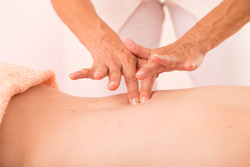 Close-up of Reiki Back Massage.