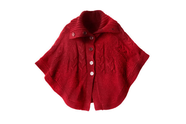 Knitted cape isolated Red wool knitted cape on white background coat wool button clothing stock pictures, royalty-free photos & images