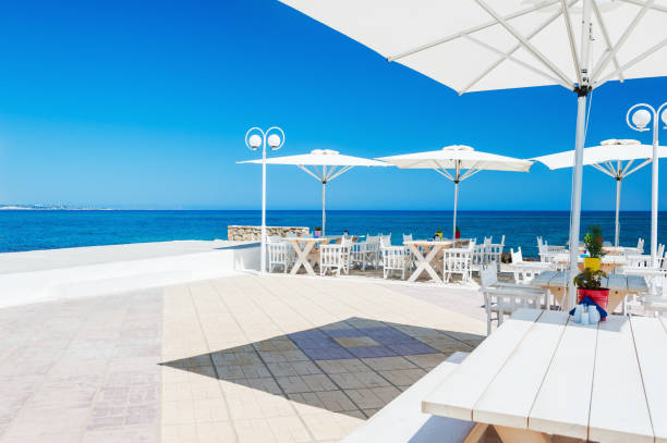 istock Cafe on the beach, Crete, Greece. 907563410