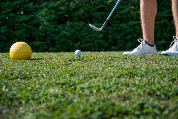 istock Golfer Getting Ready for Teeing Off the Ball 907563614