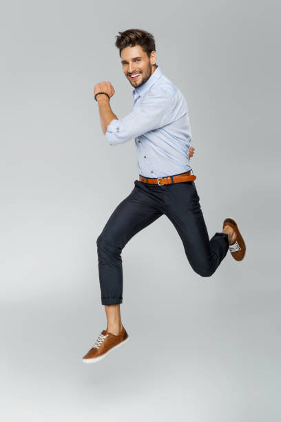 Handsome man Handsome man jumping jumping stock pictures, royalty-free photos & images