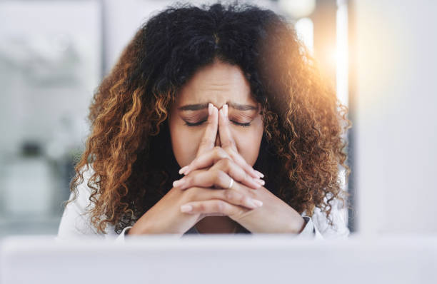 istock The pressures of work are bringing her down 907579202