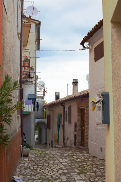 istock Old little italian street. 907582952