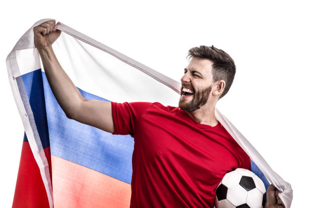 istock Russian male athlete / fan celebrating on white background 907591138