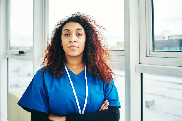 istock Confident female surgeon in scrubs 907591238