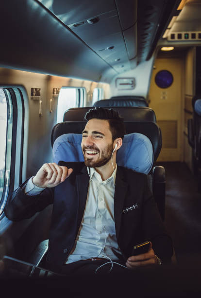 istock Businessman Taking Public Transportation 907598494