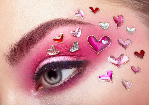 istock Eye make-up girl with a heart 907600380
