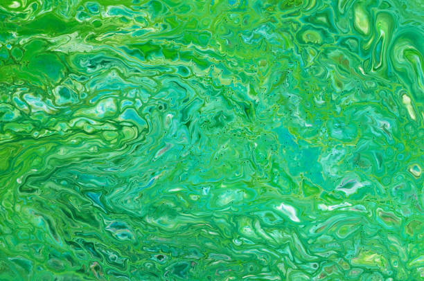 istock Fluid Art. Abstract colorful background, wallpaper, texture. Mixing  paints. Modern art. Marble texture 907604894
