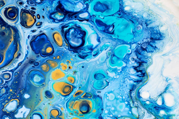 istock Fluid Art. Abstract colorful background, wallpaper, texture. Mixing  paints. Modern art. Marble texture 907605210
