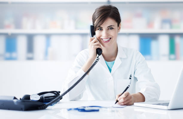 istock Doctor on the phone 907614848