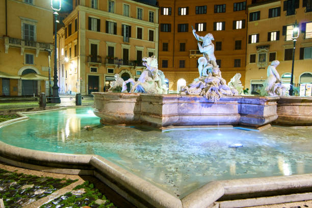 istock Piazza Navona, rainy night - Rome 907614858
