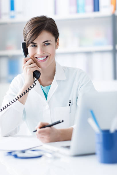 istock Doctor on the phone 907617216