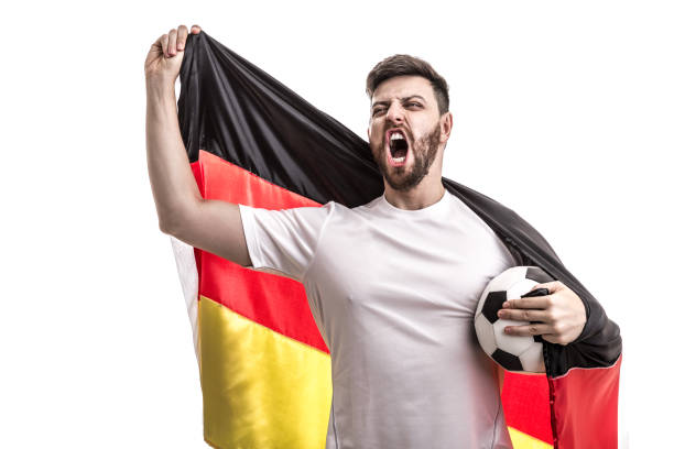 German male athlete / fan celebrating on white background