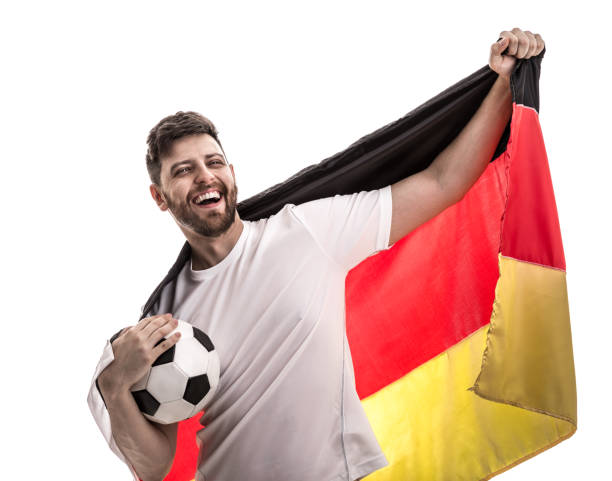 istock German male athlete / fan celebrating on white background 907618230