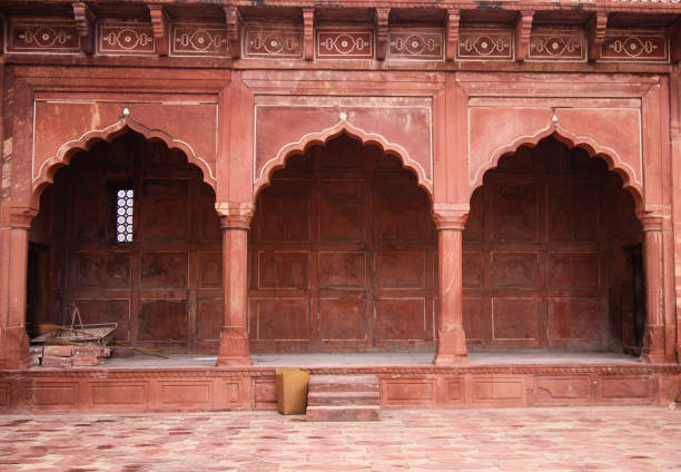 Indian Design Antique Doors Indian Temple Door at Agra at the Taj Mahal surrounding buildings india indian culture taj mahal temple stock pictures, royalty-free photos & images