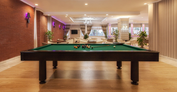 Luxury hotel lobby with pool table