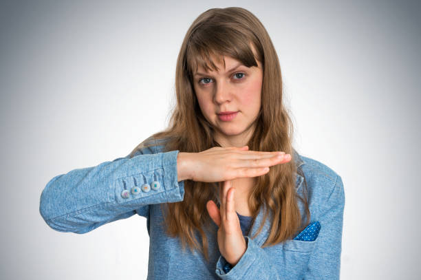 istock Business woman showing time out gesture 907626566