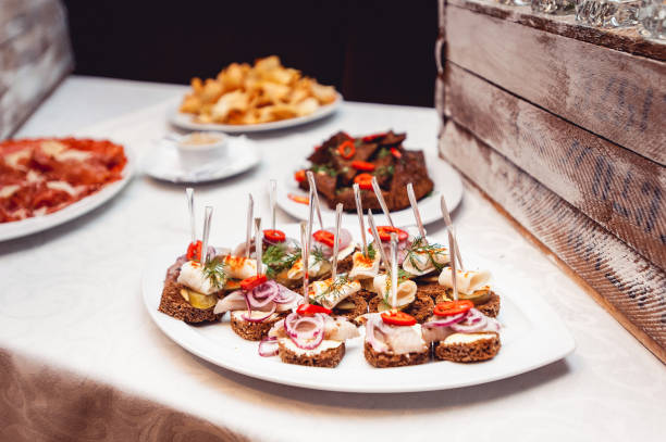 istock Hearty lard with garlic served with fresh bread on a table. 907628272