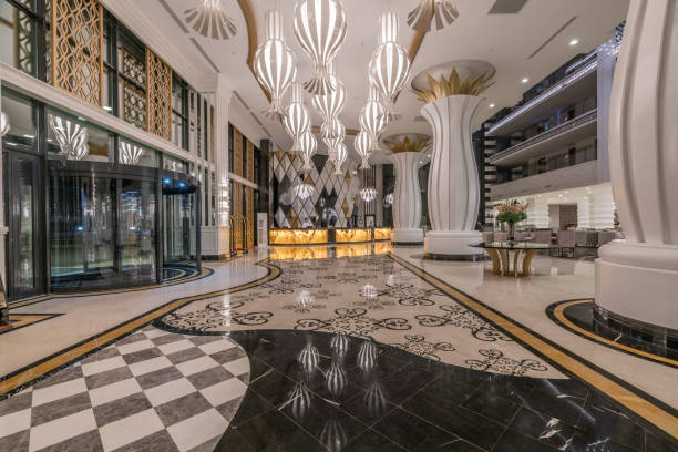 istock Lobby entrance with reception desk and lounge area 907632742