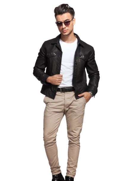 istock fashion man posing with one hand in pocket 907634158