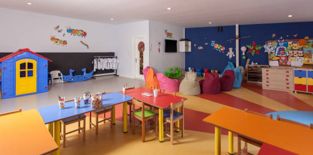 interior of preschool kindergarten - secretária mobília ilustrações imagens e fotografias de stock