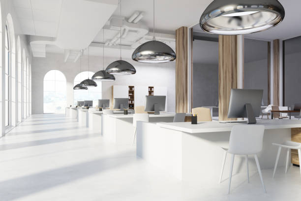 istock Gray and wooden office interior, white tables 907635026