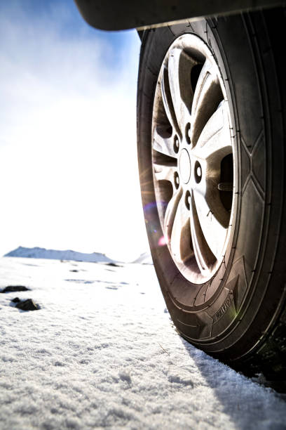 istock Winter Tire wheel in mountain 907639478