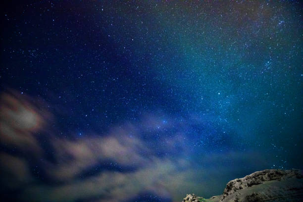 istock Multicolored northern lights - Aurora borealis - sky close up in Iceland 907640138