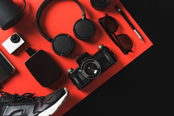 istock Black on red flat lay men's fashion and technology items 907645992