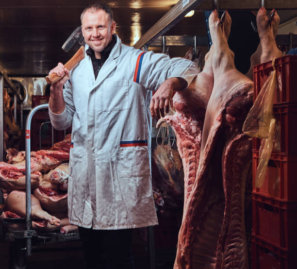 istock A butcher in a meat factory. 907648616