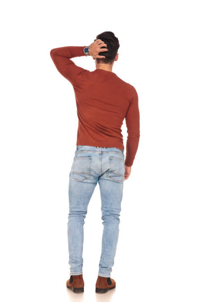istock back view of a casual man scratching his head 907648750