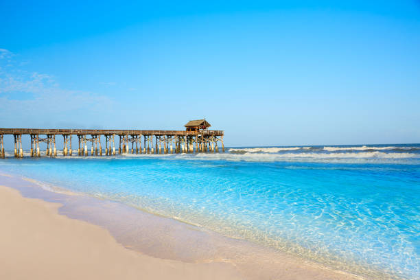 Cocoa Beach pier in Cape Canaveral Florida Cocoa Beach pier in Cape Canaveral of Florida near Orlando cocoa beach stock pictures, royalty-free photos & images