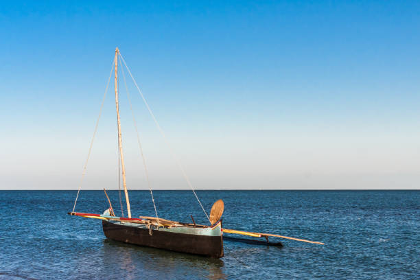 Boats at anchor, Masaka Fishing Village, Lake Malawi, Malawi, Africa. Malawi, the landlocked country in southeastern Africa, is a country of highlands split by the Great Rift Valley and the huge Lake Malawi, whose southern end is within Lake Malawi National Park and several other parks are now habitat for diverse wildlife from colorful fish to the Big Five. Cape Maclear is known for its beach resorts, whilst several islands offer rest and recreation.