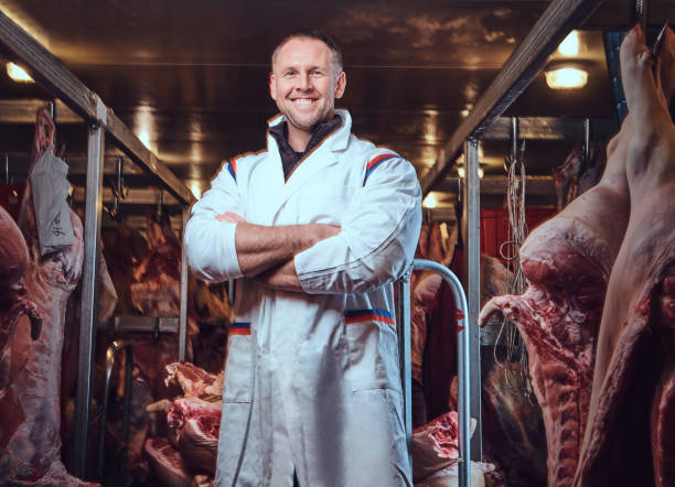 istock The butcher in a meat freezer storage. 907649636