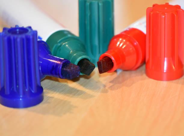 istock Three permanent markers in red, blue and green color 907649782
