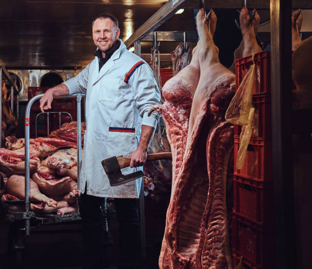 istock A butcher in a meat factory. 907656218
