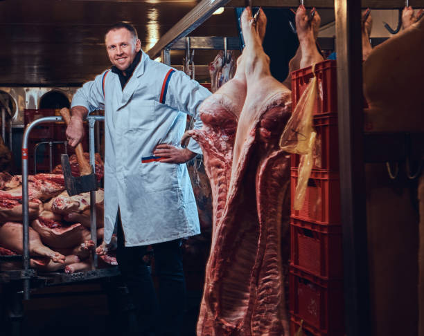 istock A butcher in a meat factory. 907656452